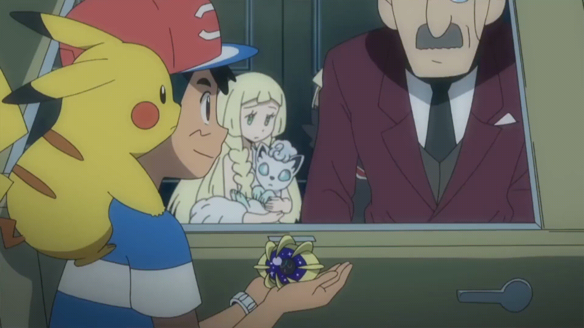 ash holding pokemon